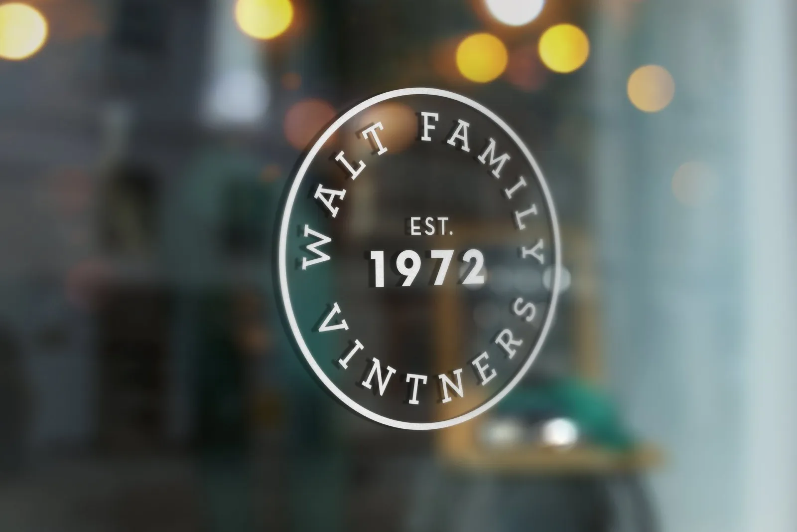 The EST. 1972 seal etched on a tasting room window